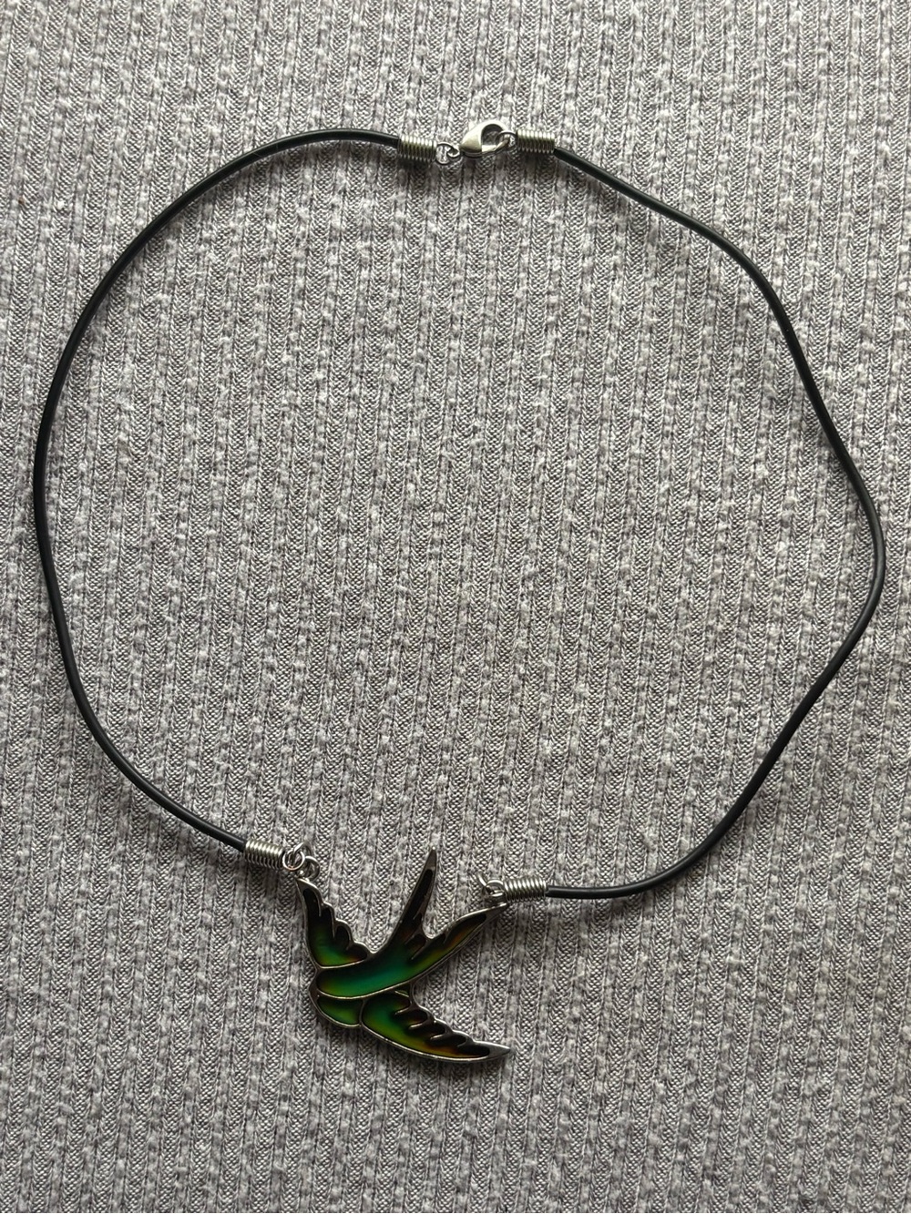Vintage silver tone bluish/green color changing bird pendant black cord necklace